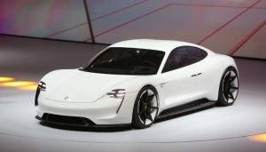 A Porsche Mission E hybrid automobile, produced by Volkswagen AG (VW), is presented during a VW event ahead of the IAA Frankfurt Motor Show in Frankfurt, Germany, on Monday, Sept. 14, 2015. The Frankfurt International Motor Show starts on Thursday, and nearly one million visitors are expected to view the latest must-have vehicles and motoring technology from over 1,000 exhibitors in a space equivalent to 33 soccer fields. Photographer: Chris Ratcliffe/Bloomberg