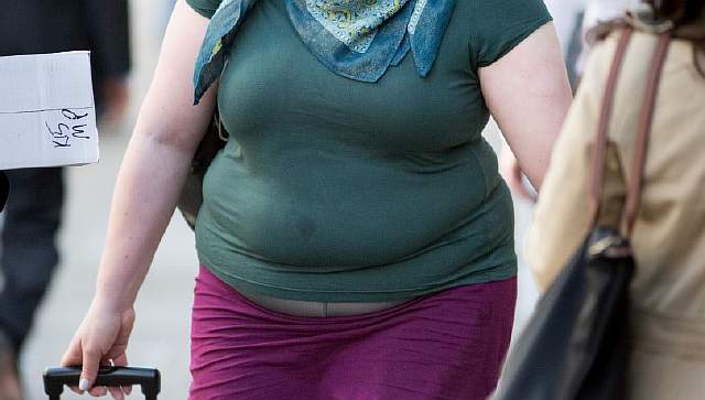 File photo dated 23/04/15 of an obese woman, as there are now more hospital admissions than ever before due to obesity, according to a new report. PRESS ASSOCIATION Photo. Issue date: Thursday April 28, 2016. There were 440,288 admissions to England's hospitals in 2014/15 where obesity was the main reason for a person being admitted or was a secondary factor. See PA story HEALTH Obesity. Photo credit should read: Daniel Leal-Olivas/PA Wire